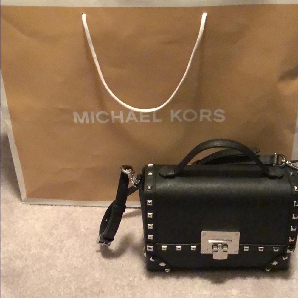 Michael Kors Tina black sm trunk bag w/silver